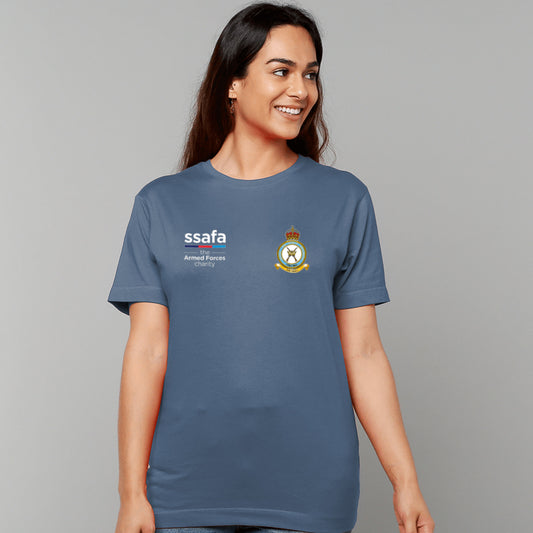 A woman wearing an indigo blue t-shirt showing an MOD licensed RAF Regiment (King's Crown) insignia to left chest and SSAFA logo to right chest.