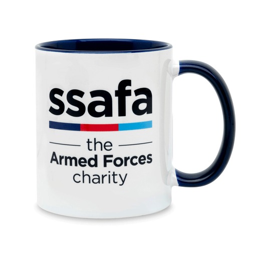 A white ceramic mug with a navy handle and interior, featuring the 'ssafa the Armed Forces charity' logo. Set against a plain white background.