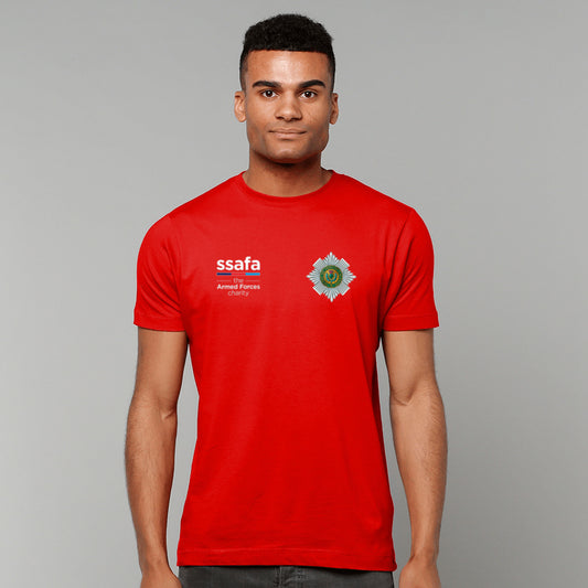 A man wearing a red short-sleeve t-shirt with 'ssafa' and Scots Guards insignia printed on the chest, photographed against a solid grey studio background.