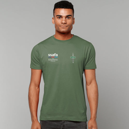 A man wearing a navy short-sleeve t-shirt with 'ssafa' and Royal Marines Commando insignia printed on the chest, photographed against a solid grey studio background.