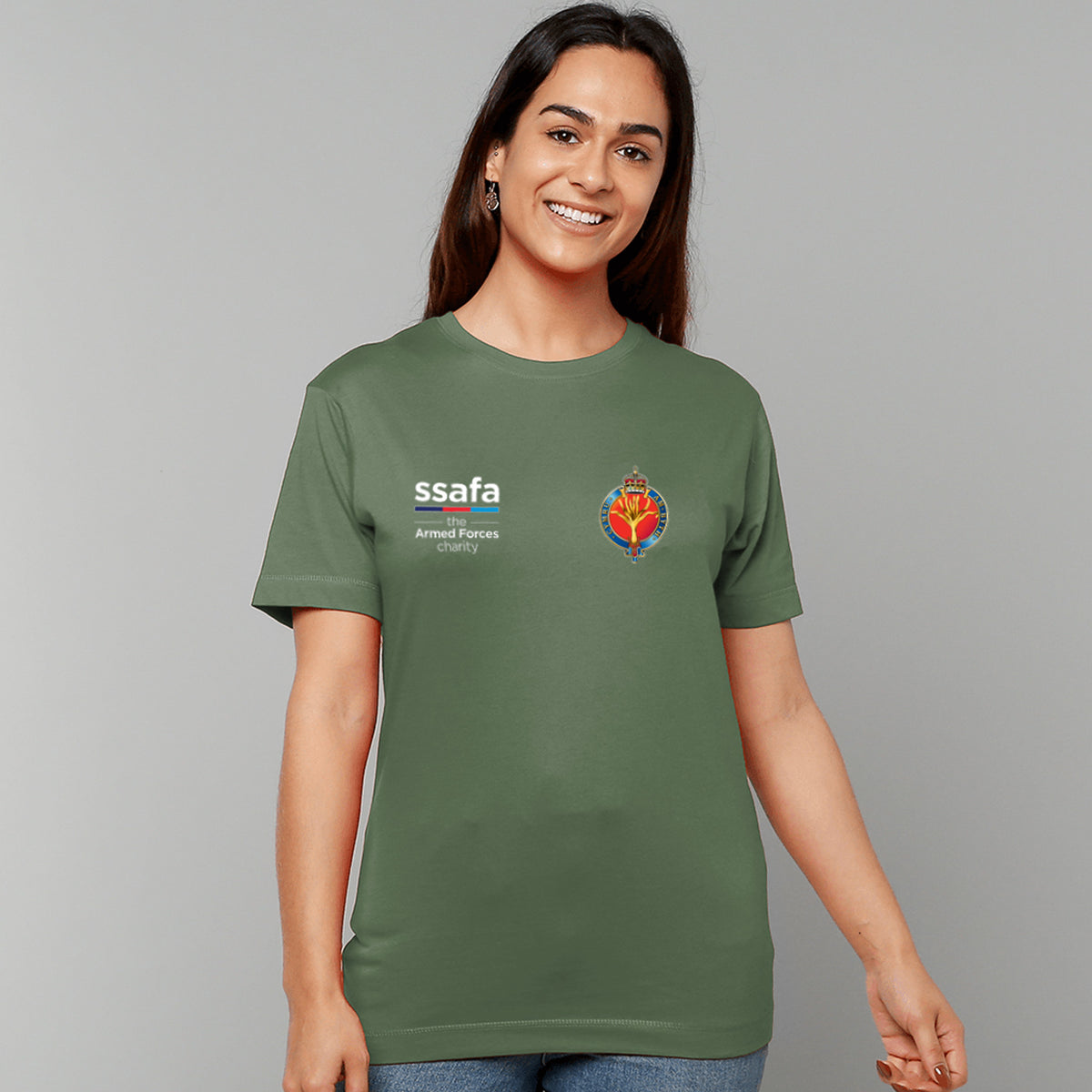 A woman wearing a military green t-shirt showing an MOD licensed Welsh Guards (King's Crown) insignia to left chest and SSAFA logo to right chest.