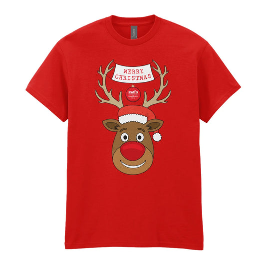 A red short-sleeve crewneck t-shirt featuring a cartoon graphic of a reindeer with brown antlers, a red nose, a Santa hat, and a banner that reads 'MERRY CHRISTMAS'.