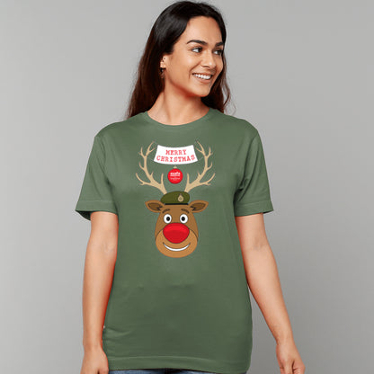A woman wearing a military green short-sleeve crewneck t-shirt featuring a cartoon graphic of a reindeer with brown antlers, a red nose, an Army hat, and a banner that reads 'MERRY CHRISTMAS'.