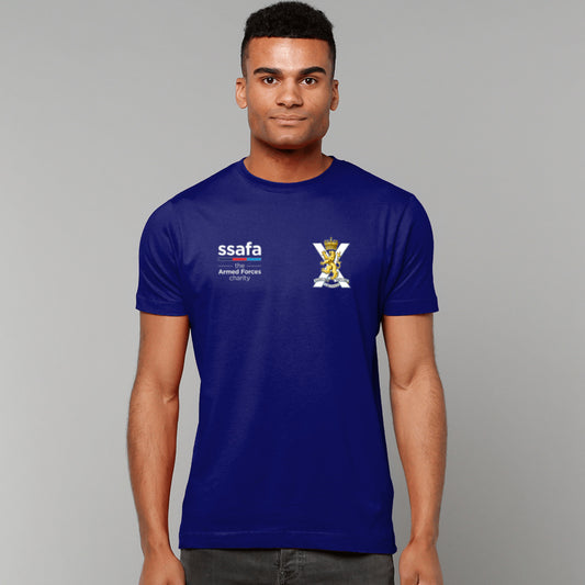A man wearing a navy t-shirt showing an MOD licensed Royal Regiment of Scotland insignia to left chest and SSAFA logo to right chest.