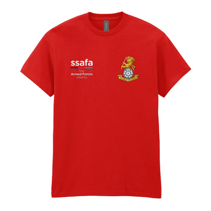 A red t-shirt showing a MOD licensed Yorkshire Regiment insignia to left chest and SSAFA logo to right chest.