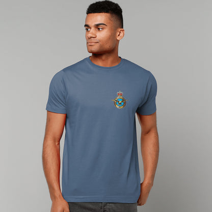 A man wearing an indigo blue t-shirt showing an MOD licensed RAF (Queen's Crown) Insignia to left chest.