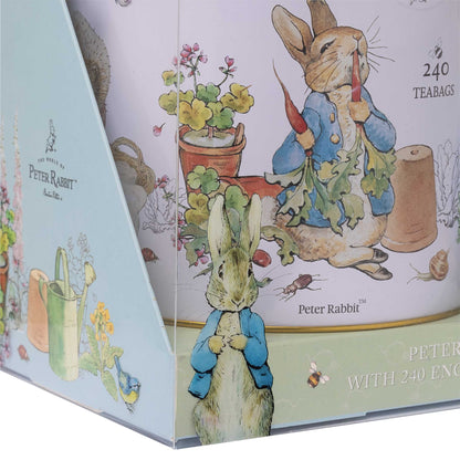 A Peter Rabbit tea bag box with illustrated cover art showing Peter Rabbit, flowers, a watering can, and the text '240 TEABAGS' and 'PETER RABBIT WITH 240 ENGLISH BREAKFAST TEABAGS