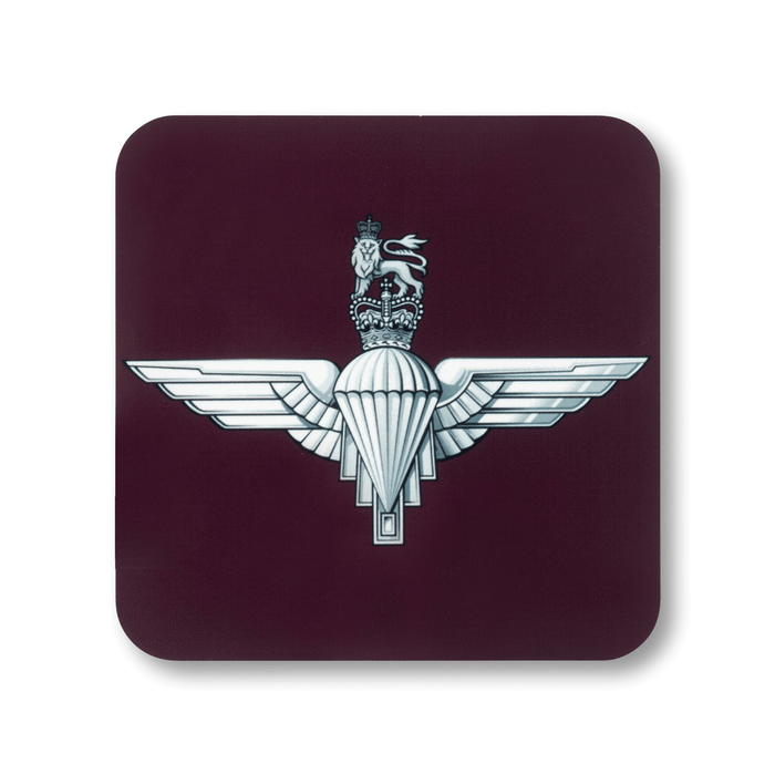 A square coaster with rounded corners featuring the Parachute Regiment (Queen’s Crown) insignia, on a maroon background.