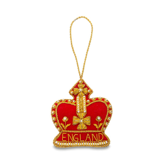 A red and gold crown-shaped England ornament with a hanging loop, featuring the word 'ENGLAND' embroidered in gold at the base.