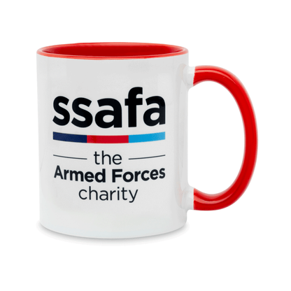 A white ceramic mug with a red handle and interior, featuring the 'ssafa the Armed Forces charity' logo. Set against a plain white background.