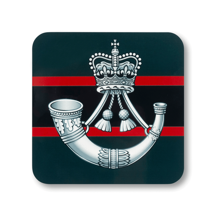 A square coaster with rounded corners featuring The Rifles (Queen’s Crown) insignia, on a striped background.