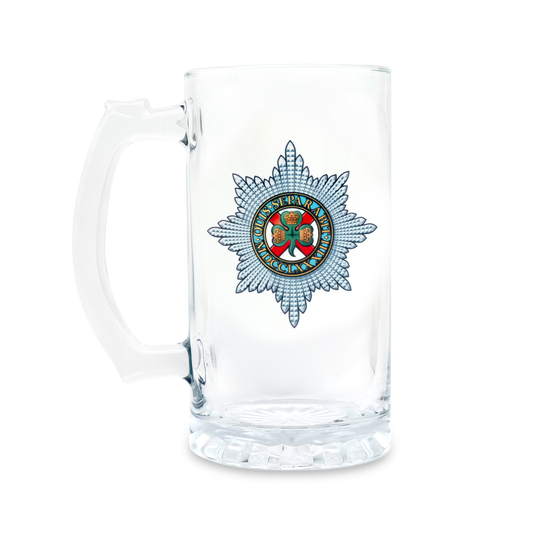 A clear glass Tankard, beer mug, featuring a printed Irish Guards insignia on the front, set against a plain white background.