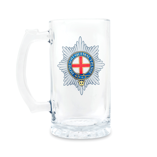 A clear glass Tankard, beer mug, featuring a printed Coldstream Guards insignia on the front, set against a plain white background.