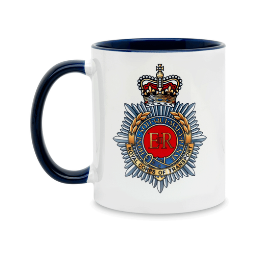 A white ceramic mug with a navy handle and interior, featuring a printed insignia of the Royal Corps of Transport on the front. Set against a plain white background.
