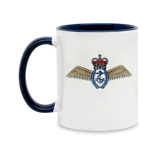 A white ceramic mug with a navy handle and interior, featuring a printed insignia of the Fleet Air Arm on the front. Set against a plain white background.