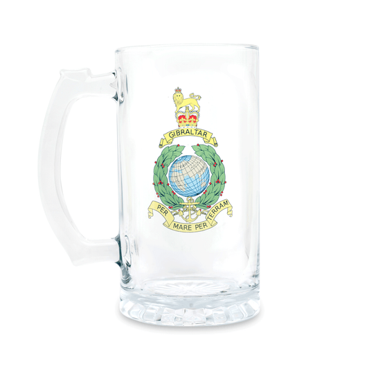 A clear glass beer mug with a printed Royal Marines insignia on the front, set against a plain white background.