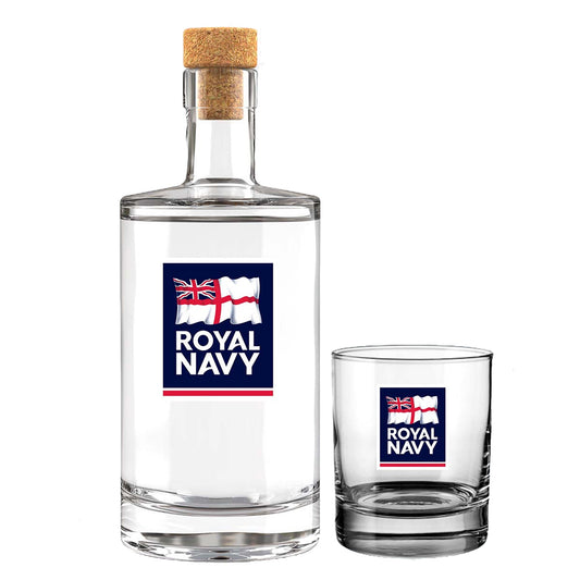 A clear glass bottle with a cork stopper and a matching small clear glass tumbler, both printed with a Royal Navy logo (White ensign with ROYAL NAVY printed underneath), on a plain white background.