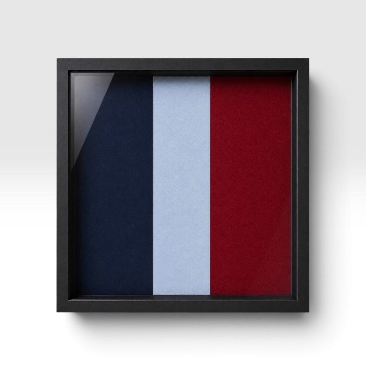 A black white frame, showing the professionally pigment-printed RAF Regiment backing.