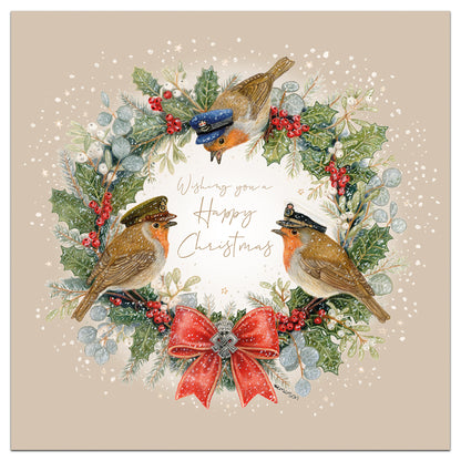Christmas card with wreath and three robins in Army, Navy and RAF hats, red berries, red bow and gold “Wishing you a Happy Christmas”.