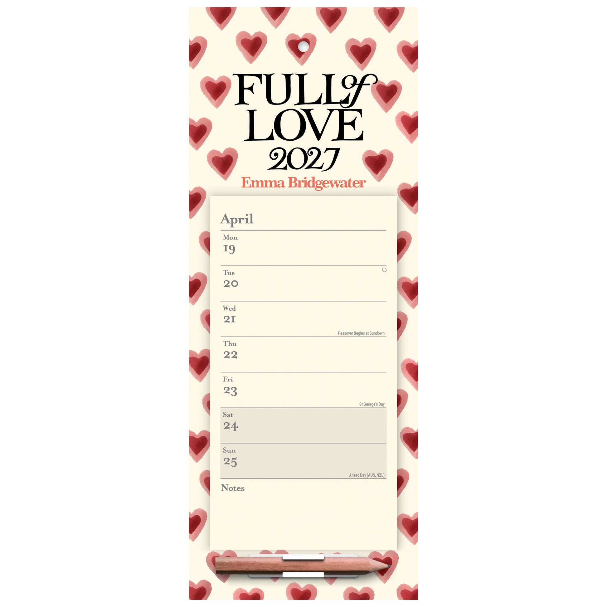 A vertical desk calendar pad titled 'FULL OF LOVE 2027' with the name Emma Bridgewater printed below. The pad has a cream background with a border of red hearts, a printed April weekly schedule, and a pencil resting at the bottom.
