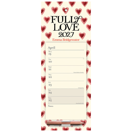 A vertical desk calendar pad titled 'FULL OF LOVE 2027' with the name Emma Bridgewater printed below. The pad has a cream background with a border of red hearts, a printed April weekly schedule, and a pencil resting at the bottom.
