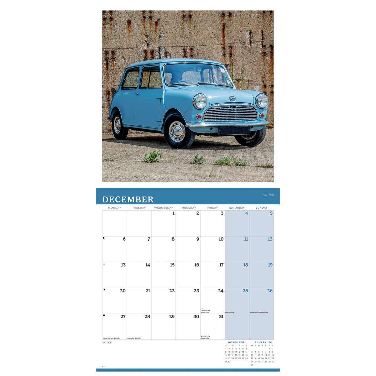 A December wall calendar page featuring a photograph of a light blue classic Mini from 1960 parked against a weathered brick wall, with a blue-and-white monthly calendar grid below.