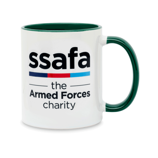 A white ceramic mug with a dark green handle and interior, featuring the 'ssafa the Armed Forces charity' logo. Set against a plain white background.